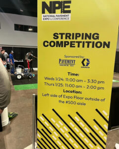 Banner showing the time and date of the Graco Line striping competition at the national pavement expo 2024 in tampa bay